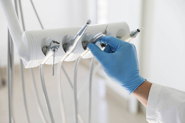 Professional Root Canal Treatment technician working in Harrisburg, AR